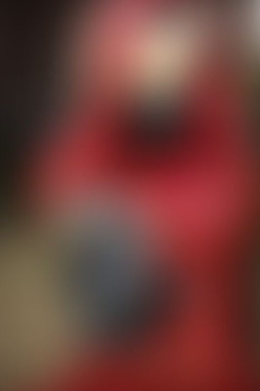 A sexy photograph of Rope Candy in red latex. Tagged with: gasmask &amp; in public. Posted September 2017.