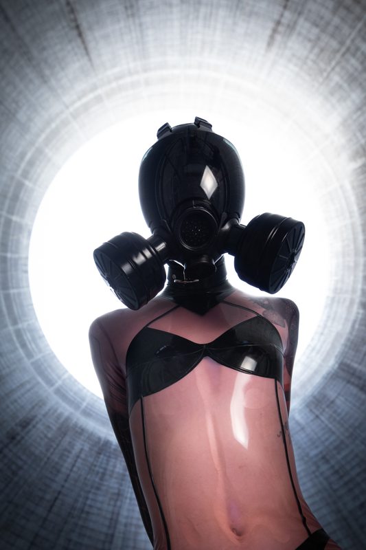 A photo album of Cam Damage & Vespa showing bare skin with black, red, transparent & purple & pink leather. Tagged with: sleepsack, metal bondage, in public, leather, straitjacket, tattoos & vacuum bondage. Posted June 2019.