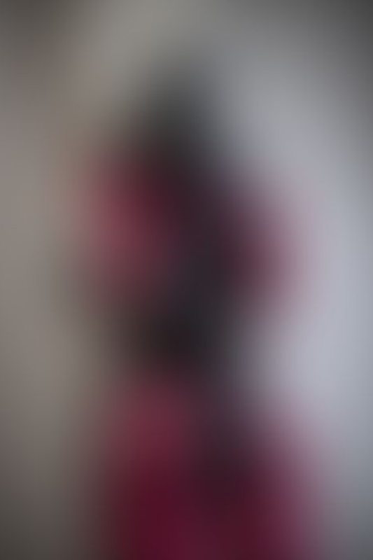 A sexy photograph of Mbot in red latex. Posted October 2019.