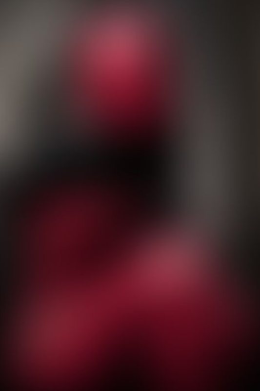A sexy photograph of Mbot in red latex. Tagged with: armbinder. Posted October 2019.