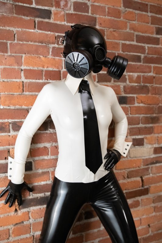 A sexy photograph of Nico in white latex. Tagged with: gasmask. Posted February 2019.