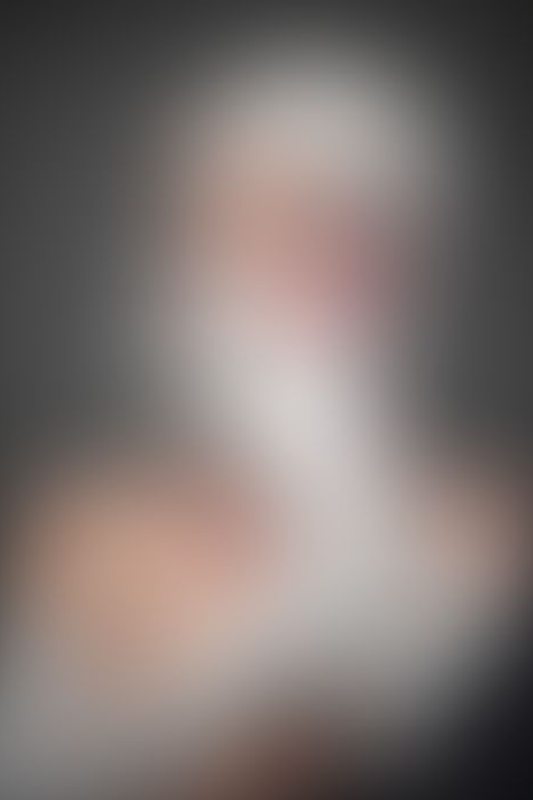 A sexy photograph of Nico in white latex. Posted February 2019.