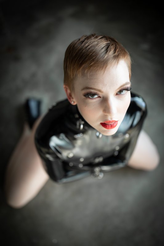 A sexy photograph of Alice in black latex. Tagged with: straitjacket. Posted January 2020.