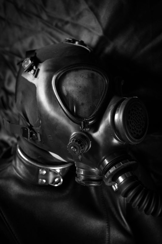 A sexy photograph of Someone. Tagged with: gasmask & straitjacket. Posted October 2015.