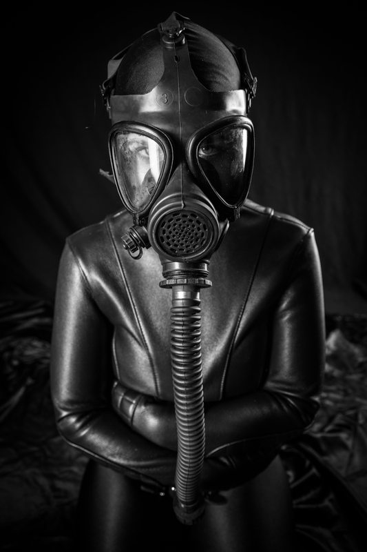 A sexy photograph of Tagged with: gasmask & straitjacket. Posted October 2015.
