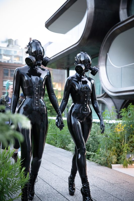A sexy photograph of Vespa & Cam Damage in black latex. Tagged with: in public & gasmask. Posted November 2019.