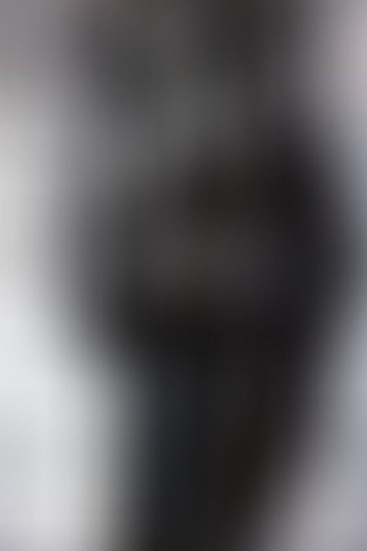 A sexy photograph of Aphrobitey in black latex. Posted May 2022.
