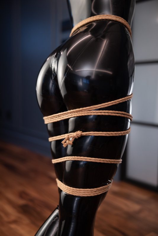 A sexy photograph of Aphrobitey in black latex. Tagged with: rope. Posted May 2022.