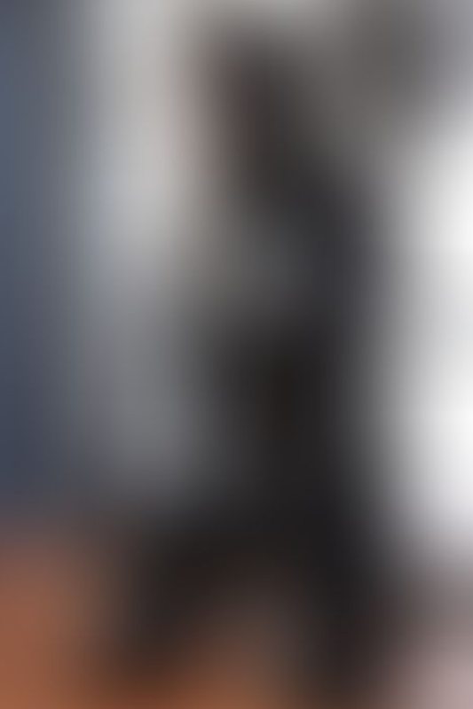 A sexy photograph of Aphrobitey in black latex. Posted May 2022.