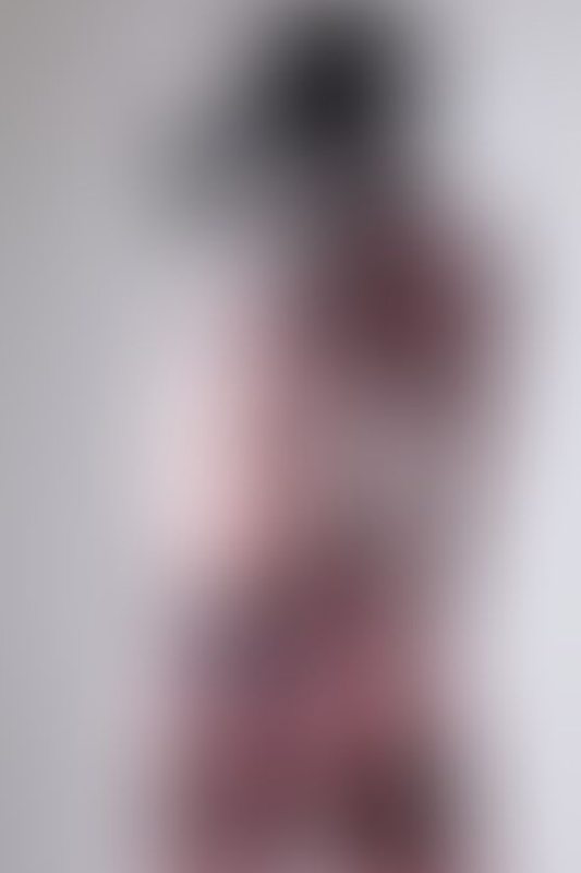 A sexy photograph of Cam Damage in transparent latex. Tagged with: gasmask &amp; tattoos. Posted September 2018.