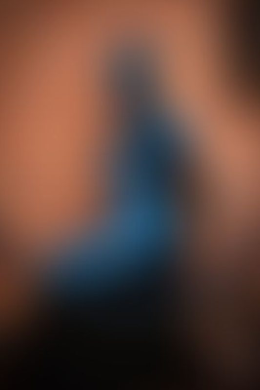 A sexy photograph of Kinki Venus in blue latex. Posted April 2020.