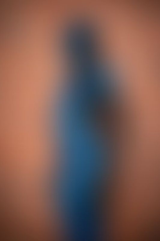 A sexy photograph of Kinki Venus in blue latex. Posted April 2020.
