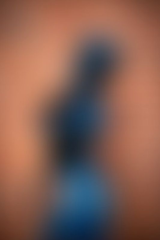 A sexy photograph of Kinki Venus in blue latex. Posted April 2020.