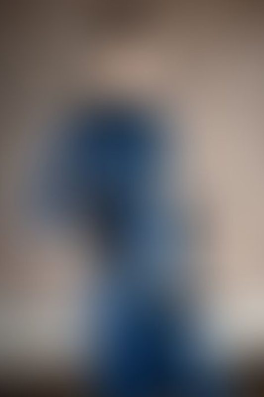 A sexy photograph of Awlivv in blue latex. Posted October 2025.
