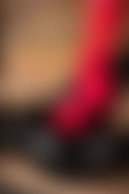 A sexy photograph of Cam Damage &amp; Vespa in black &amp; red latex. Posted December 2019.