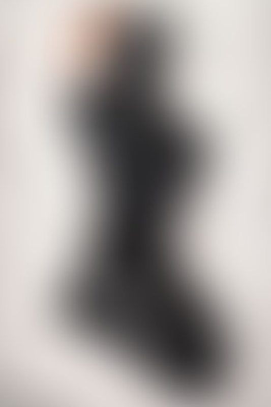 A sexy photograph of Aphrobitey in black latex. Tagged with: straitjacket. Posted March 2022.