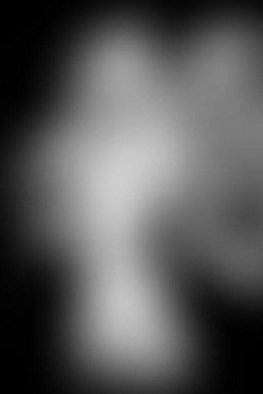 A sexy photograph of Cam Damage in transparent latex. Posted April 2021.