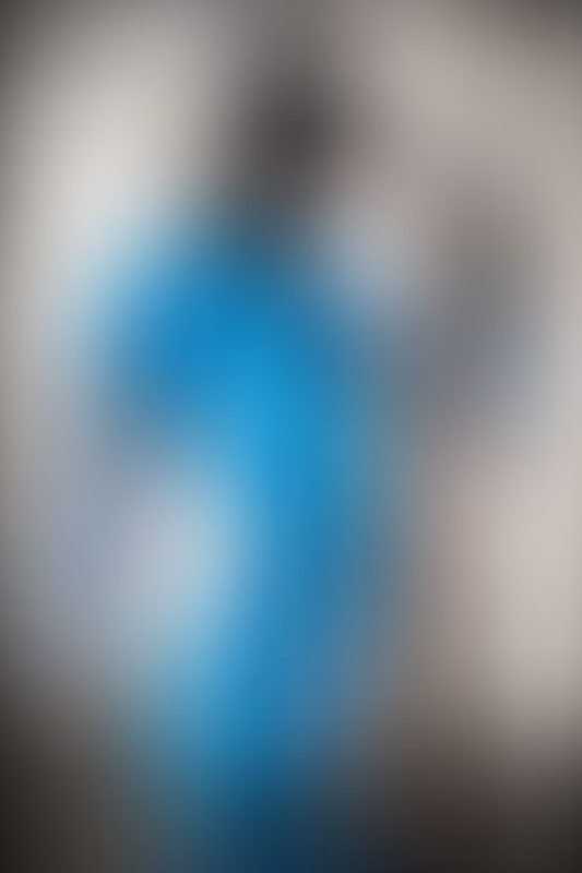 A sexy photograph of Cam Damage in transparent &amp; blue latex. Posted October 2019.