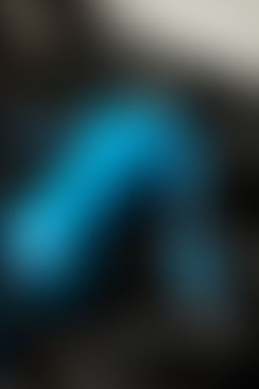 A sexy photograph of Cam Damage in transparent &amp; blue latex. Posted October 2019.