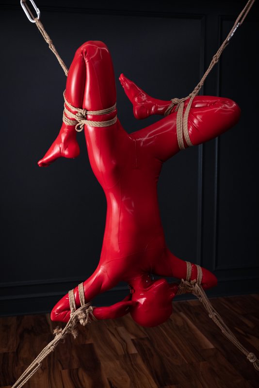 A sexy photograph of Vespa in red latex. Tagged with: rope. Posted October 2022.