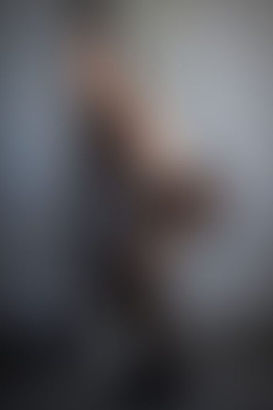 A sexy photograph of Ravyn Alexa showing bare skin with transparent latex. Posted May 2021.