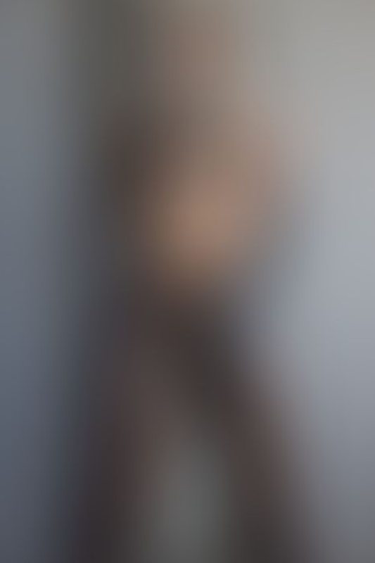 A sexy photograph of Ravyn Alexa showing bare skin with transparent latex. Posted May 2021.