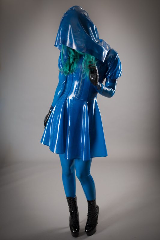 A sexy photograph of Opal Snow, in transparent & blue latex. Posted October 2017.
