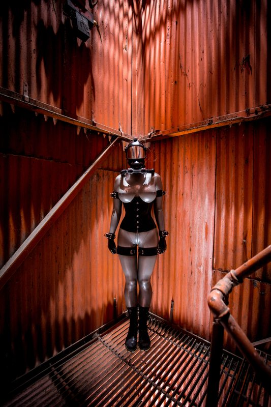 A sexy photograph of Vespa in metallic latex. Tagged with: gasmask. Posted May 2016.