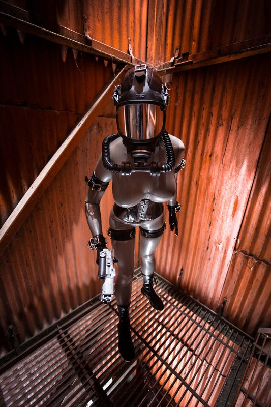 A sexy photograph of Vespa in metallic latex. Tagged with: gasmask. Posted May 2016.