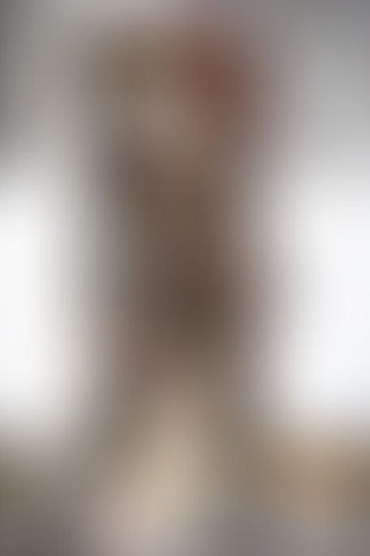 A sexy photograph of Cam Damage in transparent latex. Posted October 2019.
