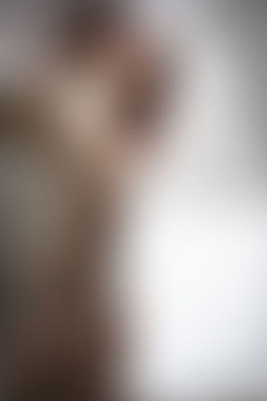 A sexy photograph of Cam Damage in transparent latex. Posted October 2019.
