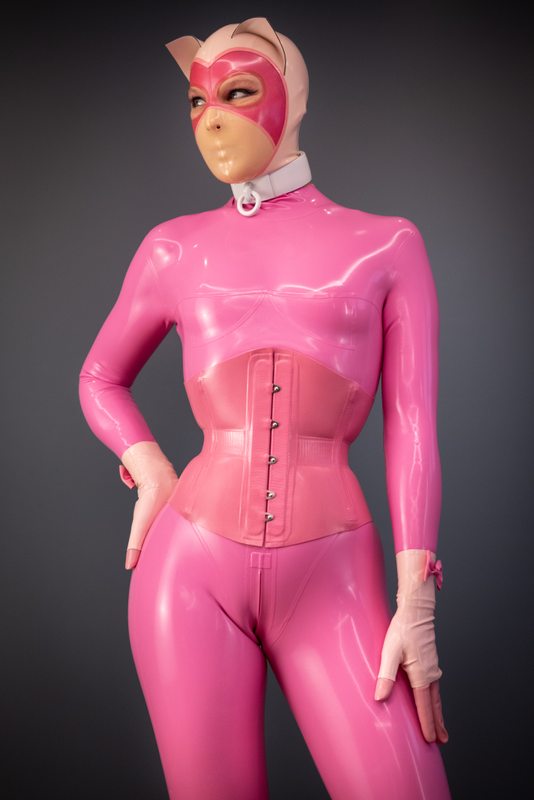 A sexy photograph of Nico in purple & pink latex. Tagged with: kitten. Posted October 2021.