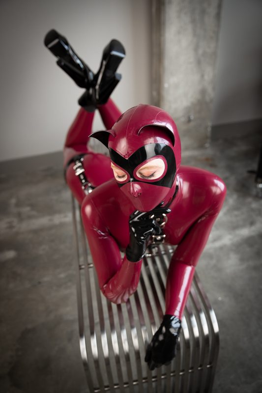 A sexy photograph of Mbot in red latex. Tagged with: kitten. Posted October 2020.