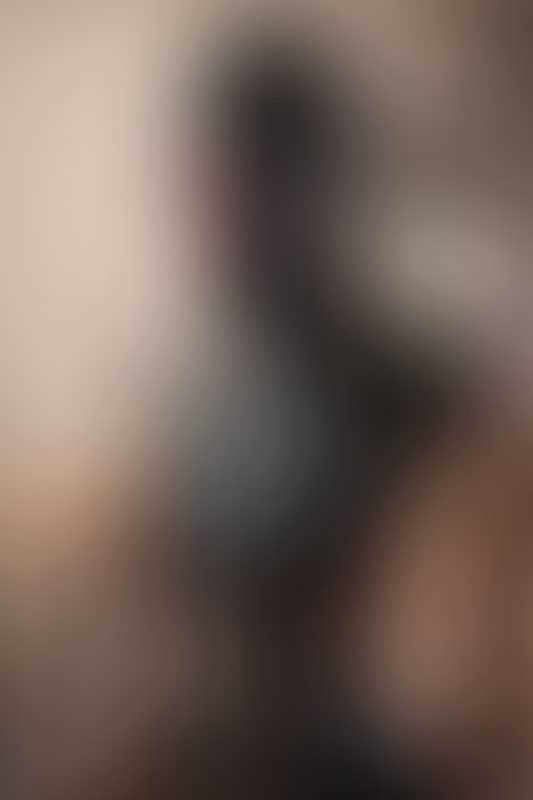 A sexy photograph of Opal Snow in black latex. Posted May 2017.
