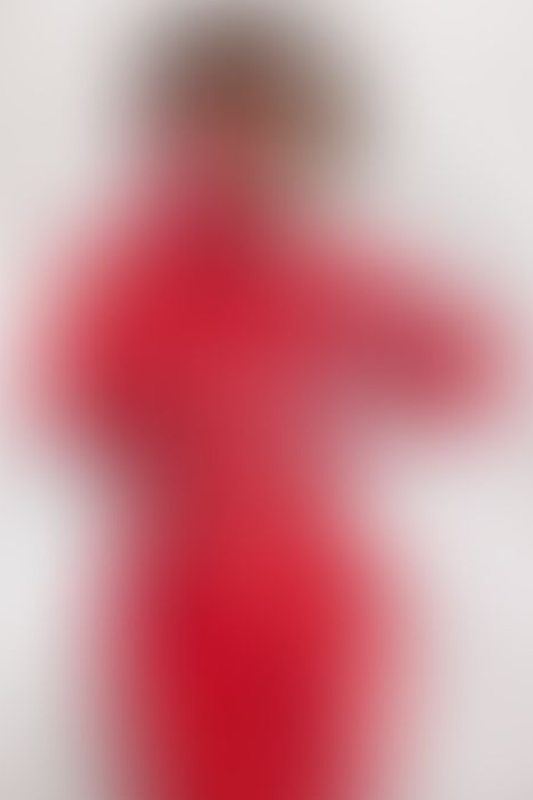 A sexy photograph of Ravyn Alexa in red latex. Posted January 2023.