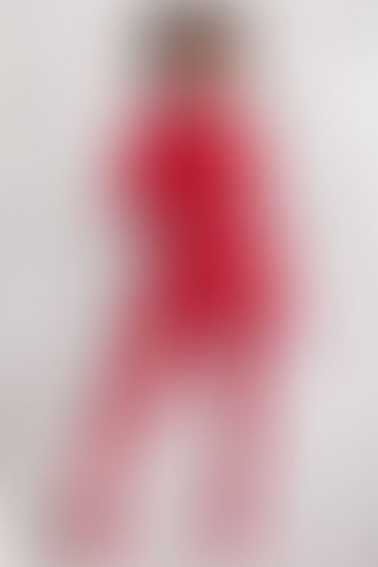 A sexy photograph of Ravyn Alexa in red latex. Posted January 2023.