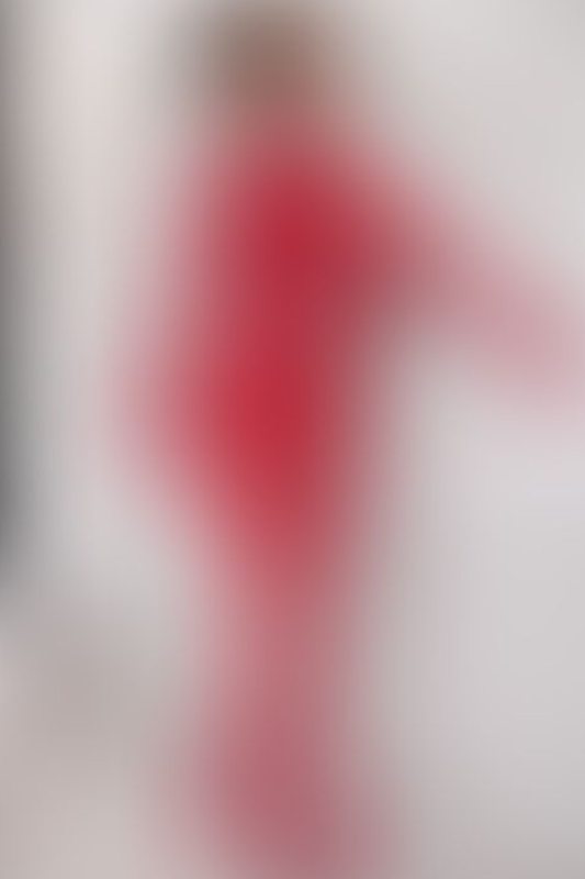 A sexy photograph of Ravyn Alexa in red latex. Posted January 2023.