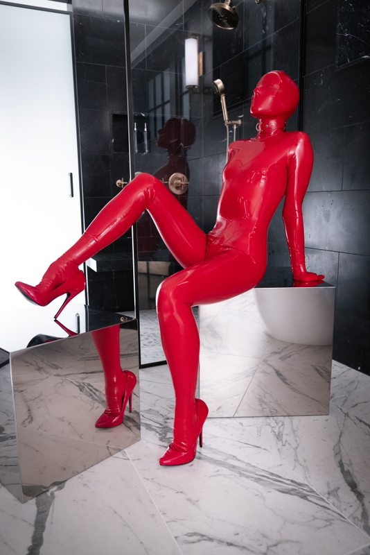 A sexy photograph of Vespa in red latex. Posted February 2022.