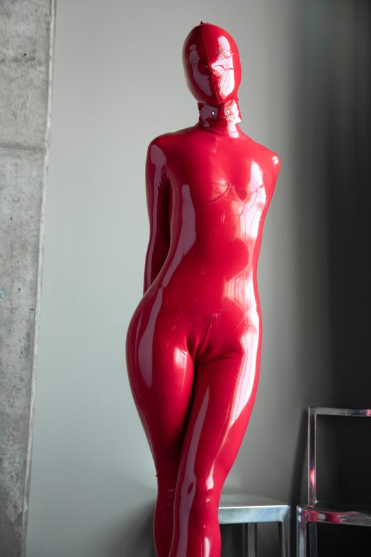 A sexy photograph of Vespa, in red latex. Posted November 2019.