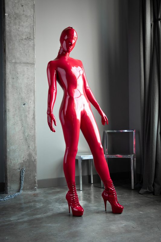 A sexy photograph of Vespa, in red latex. Posted November 2019.