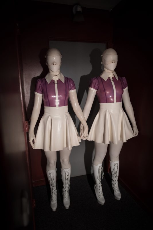 A sexy photograph of Vespa & Nico, in transparent, purple & pink & white latex. Posted December 2017.