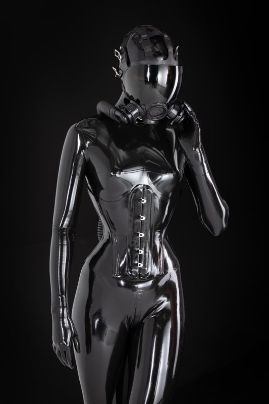 A photo album of Mbot, in black latex. Tagged with: neck corset & gasmask. Posted February 2019.