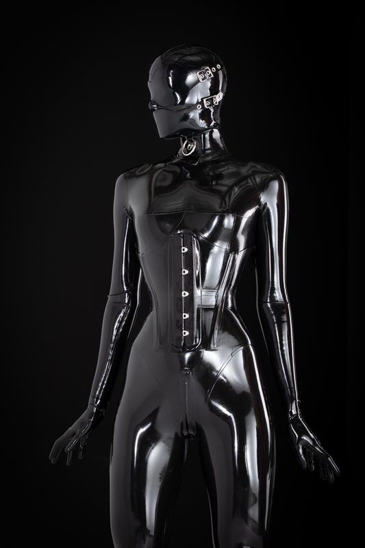 A sexy photograph of Mbot in black latex. Posted February 2019.