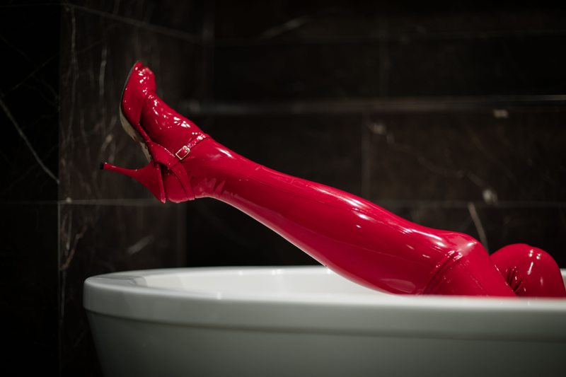 A sexy photograph of Knotasha, in red latex. Posted January 2017.