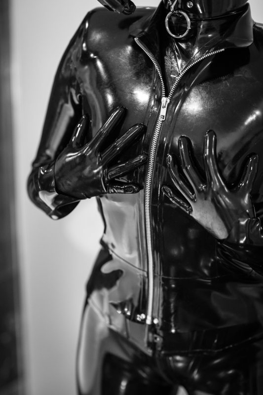 A sexy photograph of Someone, in black latex. Posted November 2016.