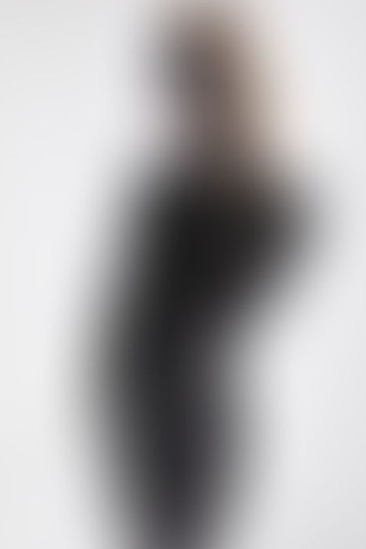 A sexy photograph of Glossy Toy in black latex. Posted May 2020.