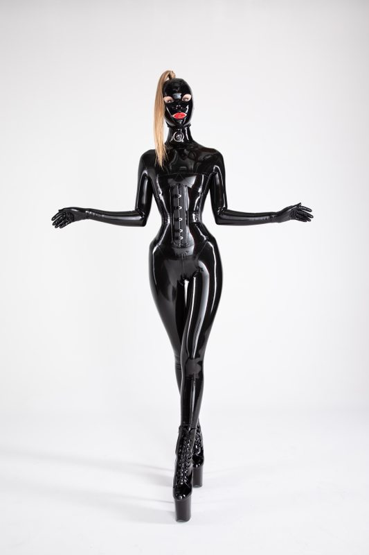 A sexy photograph of Defiantly Yours, in black latex. Posted May 2020.