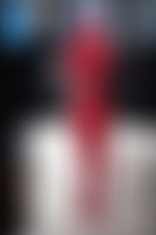 Defiantly Red A sexy photograph of Glossy Toy in red latex. Posted March 2023.