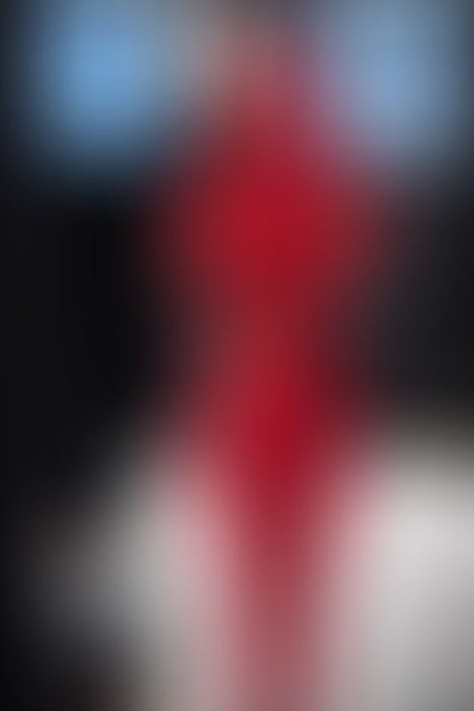 Defiantly Red A sexy photograph of Glossy Toy in red latex. Posted March 2023.