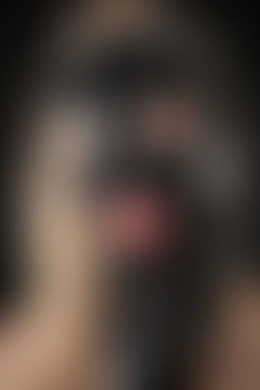 A sexy photograph of Glossy Toy in black latex. Posted January 2019.